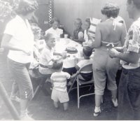 Peggy (age 28) & Betty in dungarees, Pete, Jerry, Jim, neighbors