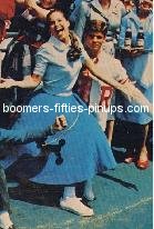 2. athletic sweater, poodle skirt